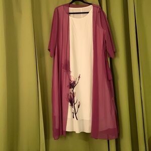 Lovely and chic tea length two piece dress. White with purple floral detail.